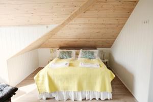 Postel nebo postele na pokoji v ubytování Frostastaðir Guesthouse