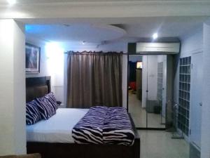 Katil atau katil-katil dalam bilik di TheoDawn Hotels @ Suite 29