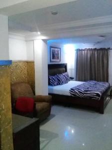 Katil atau katil-katil dalam bilik di TheoDawn Hotels @ Suite 29