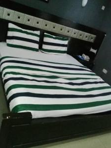 Katil atau katil-katil dalam bilik di TheoDawn Hotels @ Suite 29