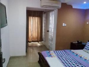 Katil atau katil-katil dalam bilik di TheoDawn Hotels @ Suite 29