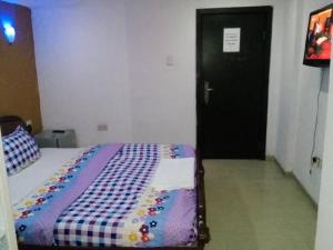 Katil atau katil-katil dalam bilik di TheoDawn Hotels @ Suite 29