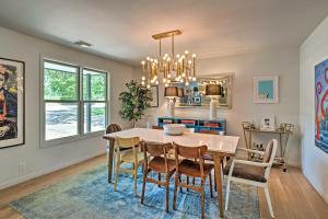 a dining room with a table and chairs at Modern Austin Home with Yard about 1 Mi from ACL! in Austin
