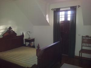 เตียงในห้องที่ Casa Cardoso
