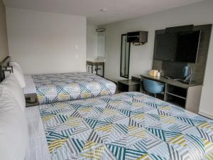 Postel nebo postele na pokoji v ubytování Motel 6 Tigard, Or - Portland Southwest