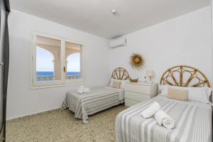Ένα ή περισσότερα κρεβάτια σε δωμάτιο στο Villa Torre Vea