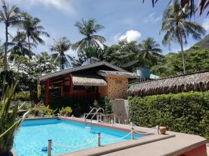 Bazén v ubytování Macura Resort nebo v jeho okolí