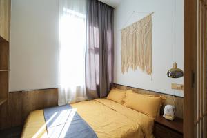 Llit o llits en una habitació de Shenzhen Ruiya Japanese-style Hotel Huaqiang North