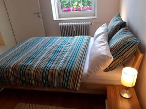 En eller flere senge i et værelse på Pension Altes Rathaus