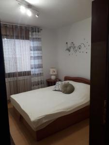 Postel nebo postele na pokoji v ubytování Apartman Panorama