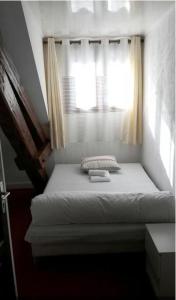 Cama o camas de una habitación en BDN Residence