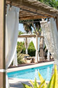 Bazén v ubytování Can Jaume Private Villas by Ocean Drive nebo v jeho okolí