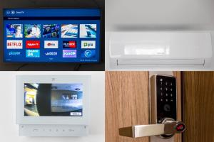 Televízia a/alebo spoločenská miestnosť v ubytovaní SKY APARTMENTS POZNAŃ