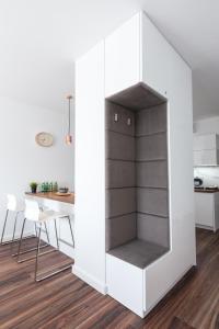 Kuchyňa alebo kuchynka v ubytovaní SKY APARTMENTS POZNAŃ