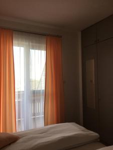 Postel nebo postele na pokoji v ubytování Pension Seeblick Latzko