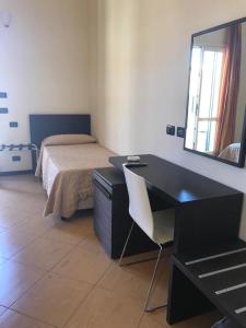 Castellammare Smart Rooms客房内的一张或多张床位