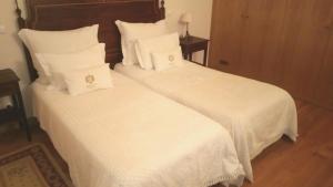 Ein Bett oder Betten in einem Zimmer der Unterkunft Hotel Rural da Quinta do Silval