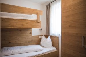 Postel nebo postele na pokoji v ubytování Apparthotel Zunneler