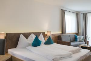 Postel nebo postele na pokoji v ubytování Apparthotel Zunneler