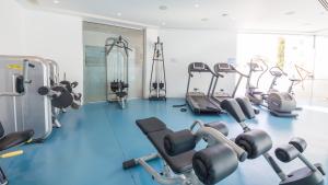 a gym with treadmills and cardio machines at Vrissaki Beach Hotel in Protaras