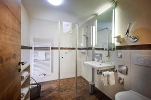 Ein Badezimmer in der Unterkunft Göbel's Hotel AquaVita
