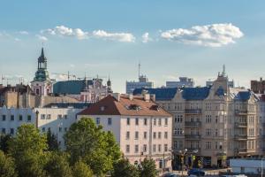 Výhľad na mesto Poznaň alebo výhľad na mesto priamo z apartmánu