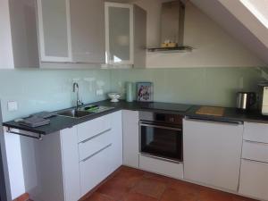 Kuchyň nebo kuchyňský kout v ubytování Ferienwohnung Haus am Barg