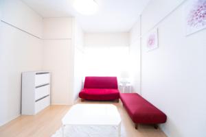 Uma área de estar em Yokkaichi Nishishinchi Hotel