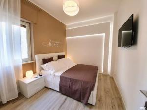 Posteľ alebo postele v izbe v ubytovaní 2B Home - Bari Centro