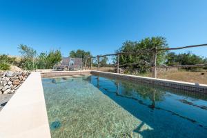 The swimming pool at or close to Can Miquel