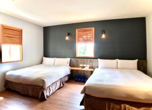 Letto o letti in una camera di Martin Wales Inn