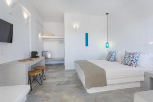 Postel nebo postele na pokoji v ubytování Aspries Suites + 37 fotografií