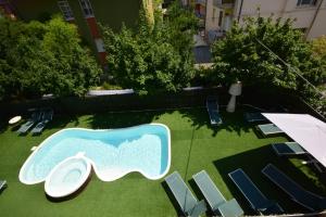 Bazén v ubytování Hotel Como nebo v jeho okolí