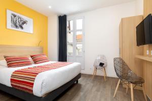 Postel nebo postele na pokoji v ubytování Hôtel Byakko Nice