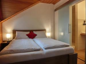 Łóżko lub łóżka w pokoju w obiekcie Aparthotel Buchauer-Tirol