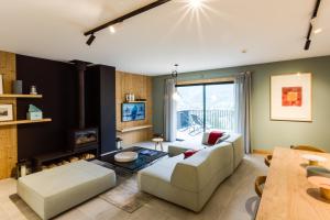 TV a/nebo společenská místnost v ubytování Le Chalet Mont Blanc