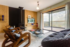 TV a/nebo společenská místnost v ubytování Le Chalet Mont Blanc