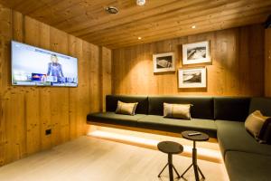 TV a/nebo společenská místnost v ubytování Le Chalet Mont Blanc