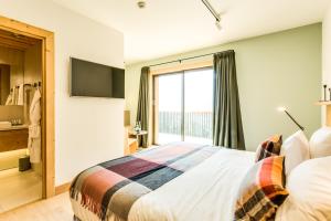 Postel nebo postele na pokoji v ubytování Le Chalet Mont Blanc