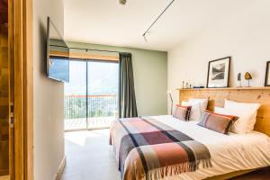 Postel nebo postele na pokoji v ubytování Le Chalet Mont Blanc