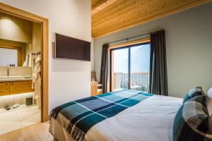 Postel nebo postele na pokoji v ubytování Le Chalet Mont Blanc