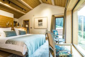 Postel nebo postele na pokoji v ubytování Le Chalet Mont Blanc
