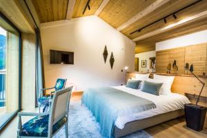 Postel nebo postele na pokoji v ubytování Le Chalet Mont Blanc