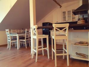 Kuchyň nebo kuchyňský kout v ubytování Apartmány na náměstí