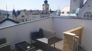 Balkón nebo terasa v ubytování Apartmány na náměstí