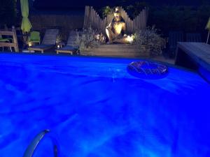 Bazén v ubytování B&B wellness Sea Nat voor Naturisten nebo v jeho okolí