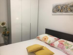 Postel nebo postele na pokoji v ubytování Apartman u srcu grada - Ilićev prolaz