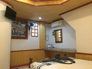 Postel nebo postele na pokoji v ubytování Big Fish Resort Koh Tao