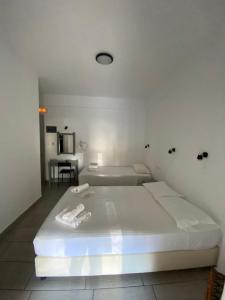 Posteľ alebo postele v izbe v ubytovaní Deep Blue Rooms & Apartments