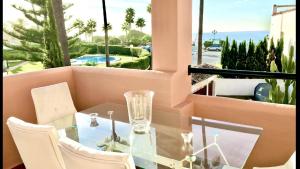 The swimming pool at or close to MARBELLA ALICATE BEACHFRONT - Luxury Apartment-2